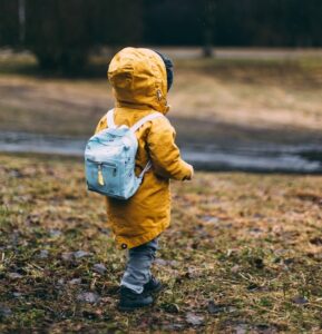 child with backpack